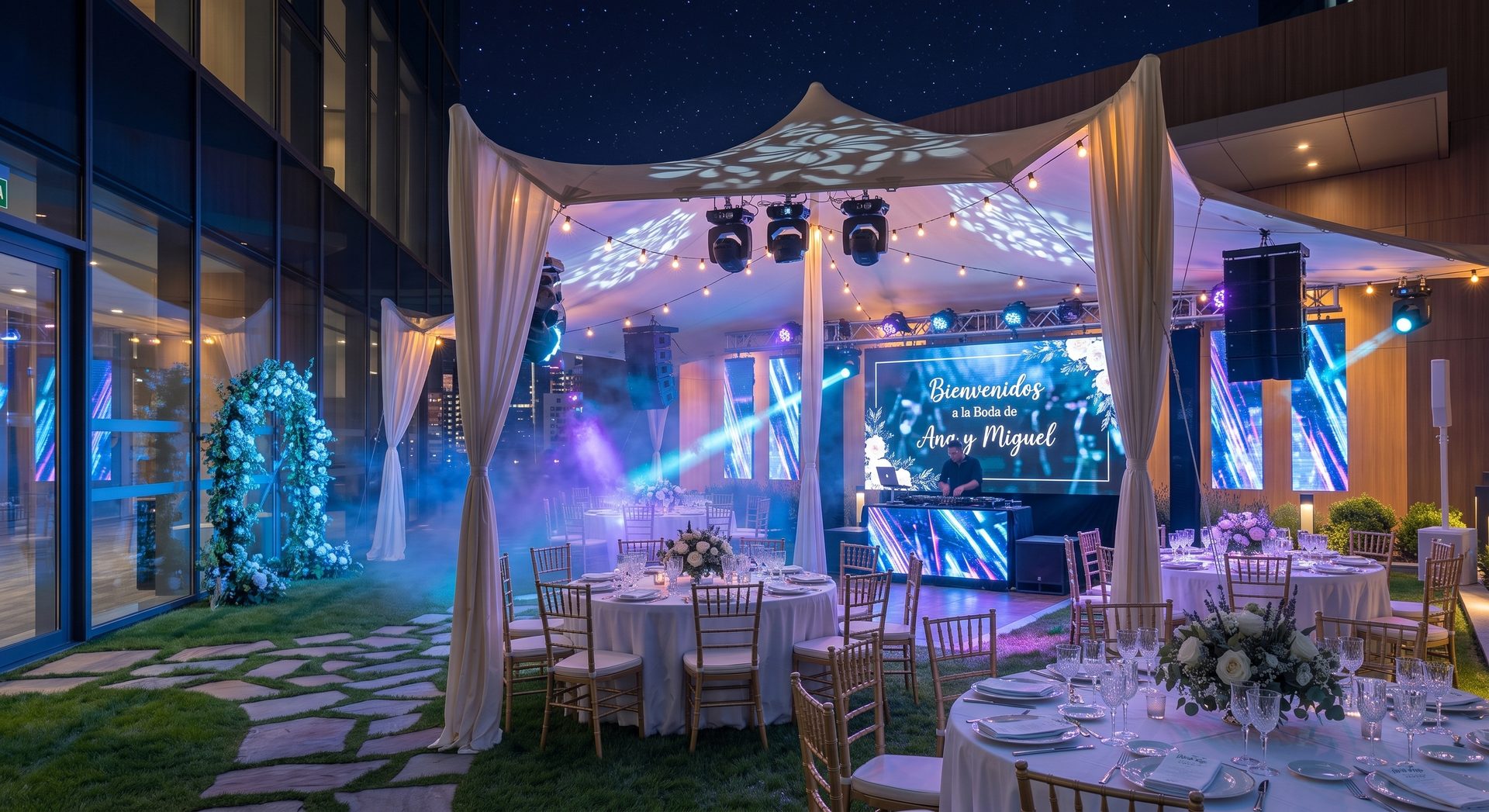El mismo espacio encendido: pantallas LED, iluminación y sonido en plena boda